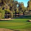 A view of a green with water coming into play at Mesa Country Club.