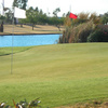 A view of the chipping green with water in background at Rio Salado Golf Course