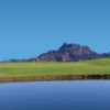 A view over the water of green at Painted Mountain Golf Club