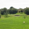 A view of a hole guarded by sand traps at San Ignacio Golf Club