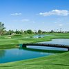 A view of green #17 surrounded by water at Superstition Springs Golf Club