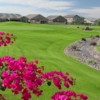 A view of the 15th green with stream on the right at Augusta Ranch Golf Club