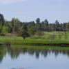 A view of the lake and green at Continental Country Club
