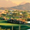 A view of a green with water on the right side at Cochise Course from Desert Mountain Golf Club
