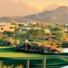 A view of a green with water on the right side at Cochise Course from Desert Mountain Golf Club