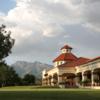 A view of a tee and the clubhouse on the right side at Tucson Country Club