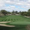A view of the 11th green protected by sand traps at Oro Valley Country Club