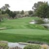 A view hole #18 with water coming into play at Oro Valley Country Club