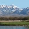 View of a green over water at Torres Blancas Golf Club