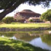 A view of a hole and the clubhouse in background at Hidden Cove Golf Course.