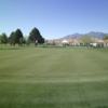 A view of a hole and the clubhouse at Pueblo del Sol Golf & Country Club.