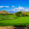 A nice warm day view of a green at Starr Pass Golf Club.