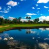 A view of a green with water and bunkers coming into play at Arizona Country Club.